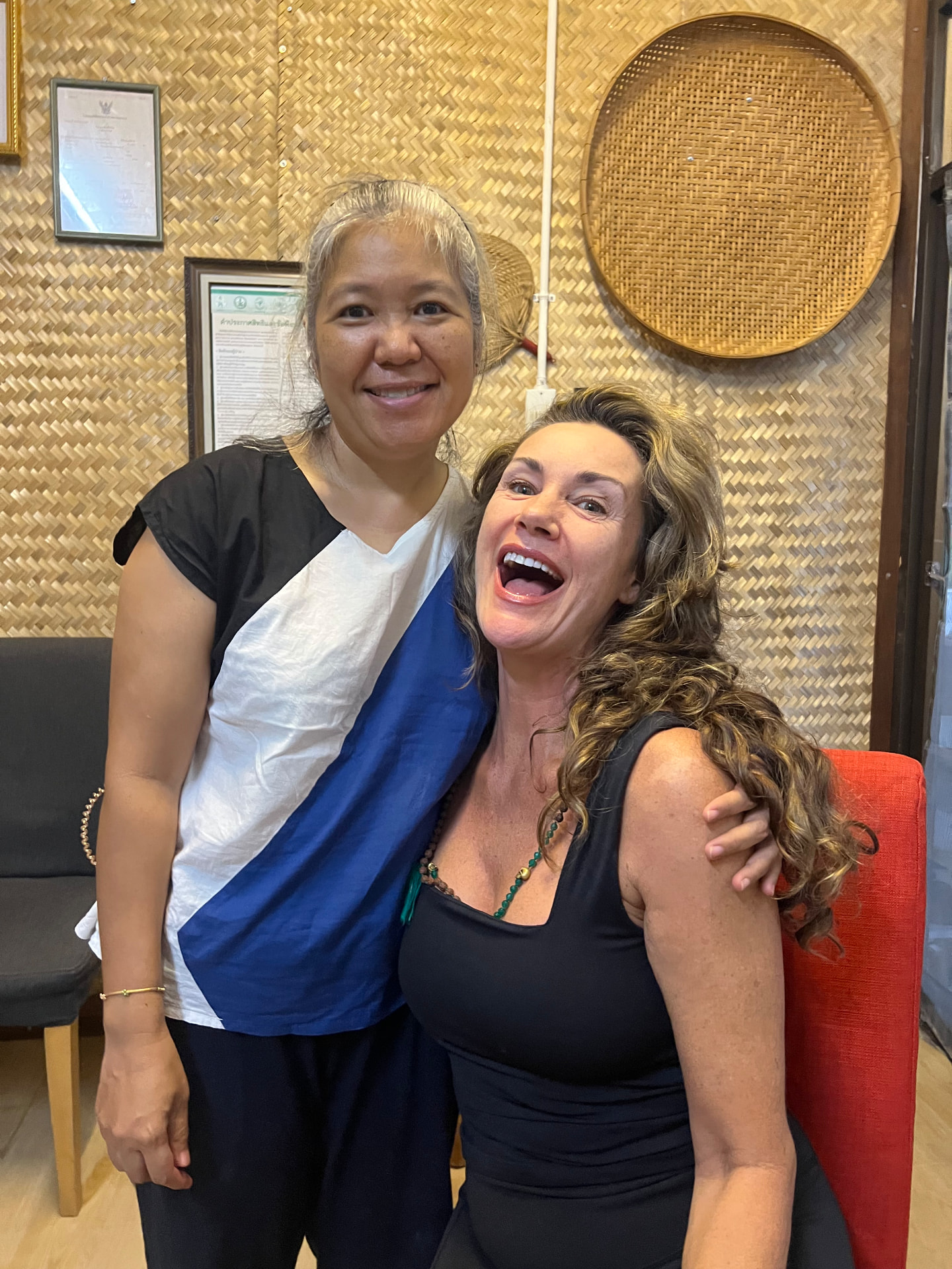 Dr. Nooy with a student at Sirichan Thai Healing Center