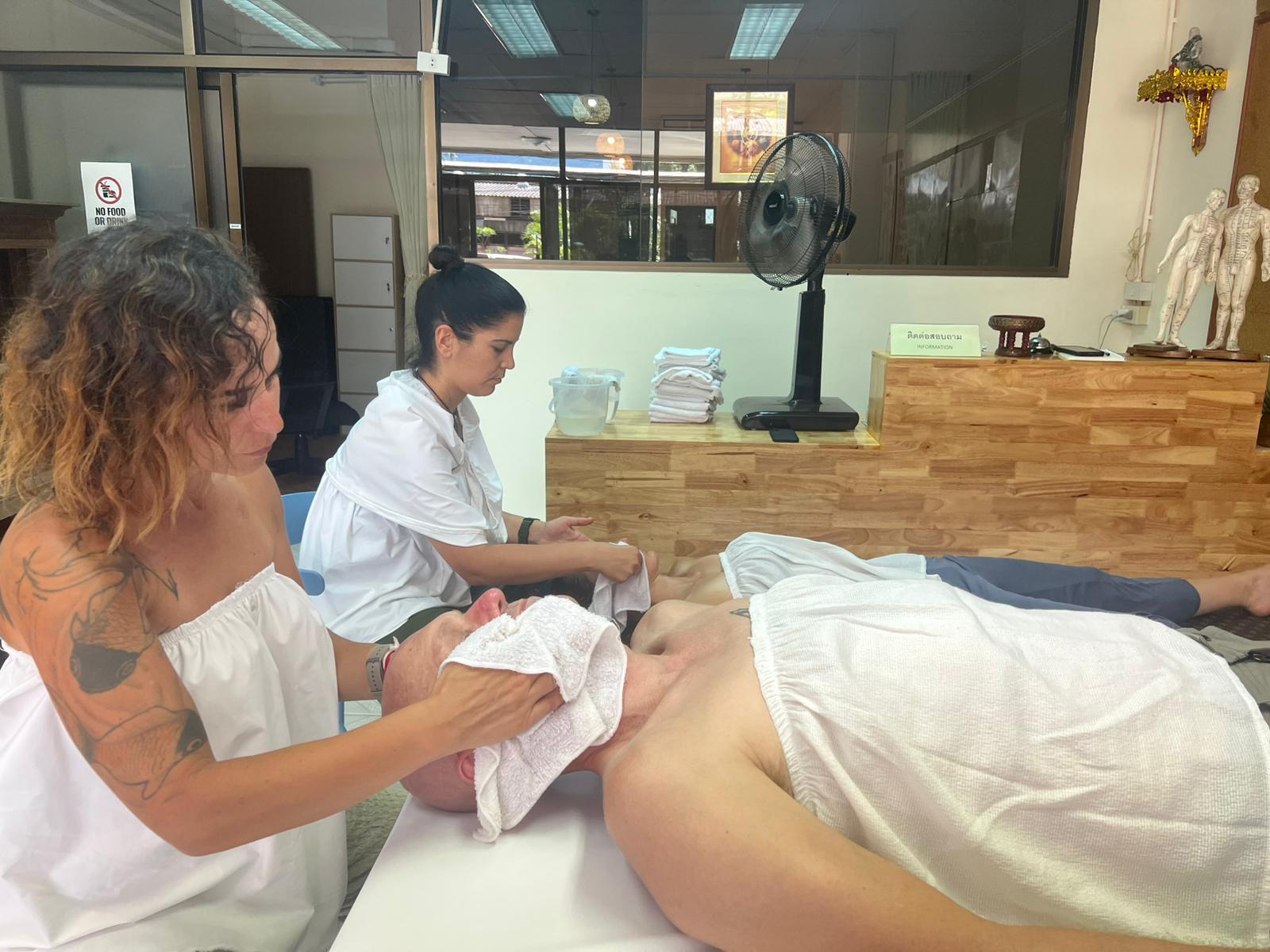 Small group practice during a course at Sirichan Thai Healing Center