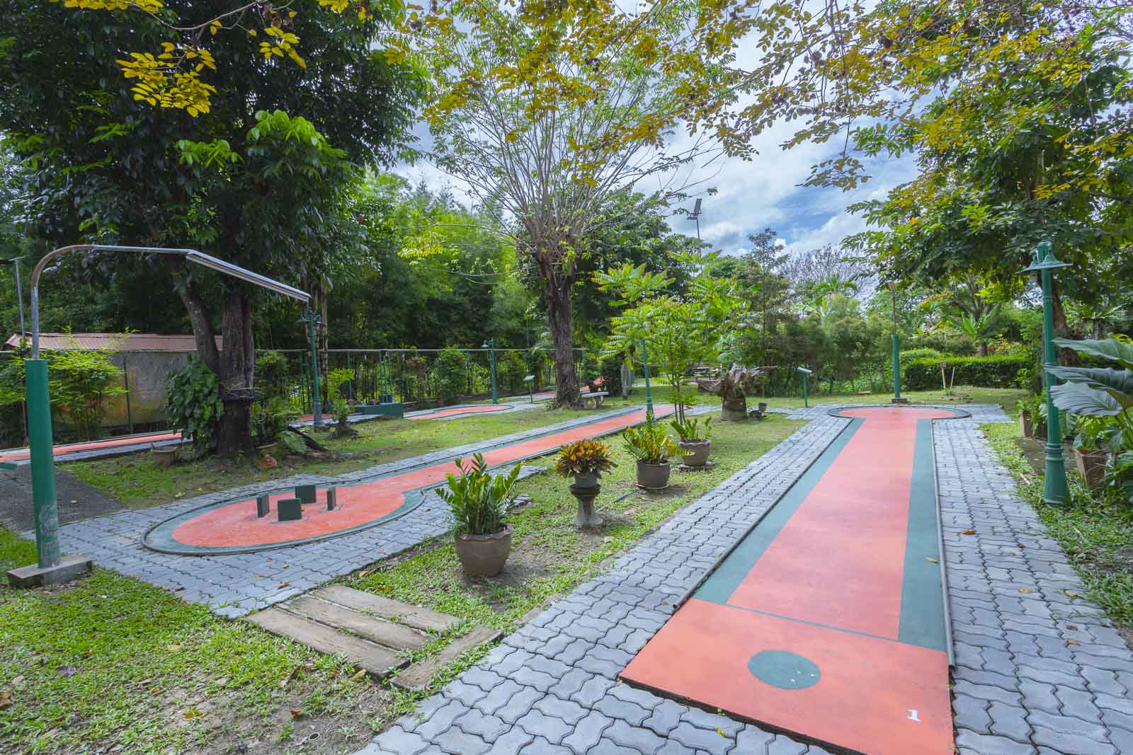 Minigolf course under shade trees